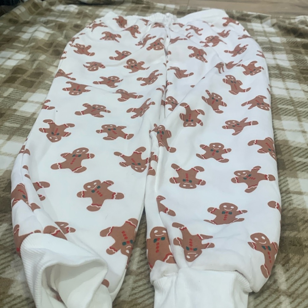 Cute ginger man sweatpants that are white.